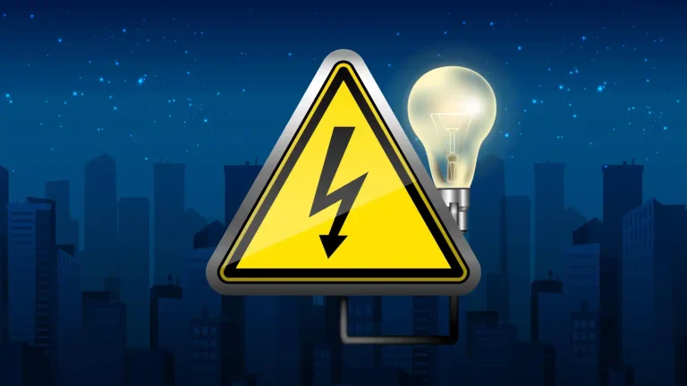 Cando a luz marcha a saúde treme Un símbolo de advertencia de electricidad con una bombilla encendida.